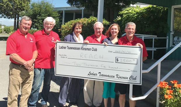 Reach Child and Youth Development Society receives $2,500 from the Kinsmen Club of Ladner-Tsawwassen, a partner in project to construct a child development centre in the heart of Ladner. Taking part in the presentation are (from left) Greg Cook, Ian Sandham, Renie D’Aquila, Dave MacMillan, Kristin Bibbs and Stuart Holmes.