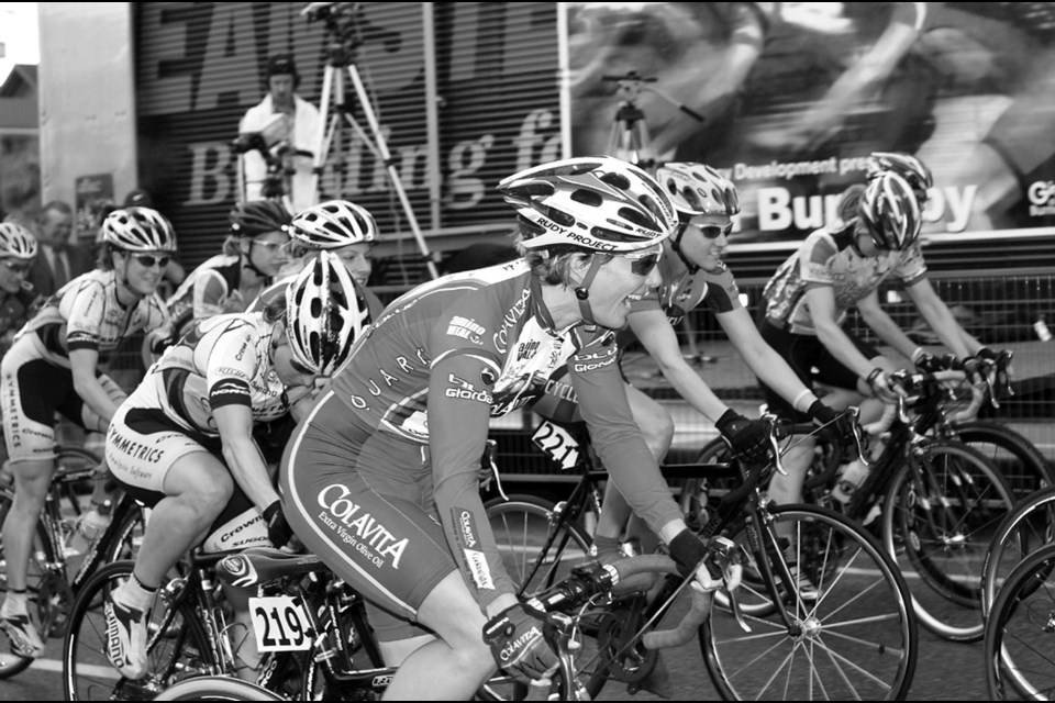 Speed merchant: World No. 1 track racer and Burnaby resident Gina Grain, bike No. 219, centre, won the inaugural women’s Giro di Burnaby criterium held on July 14, 2006 in the Heights. Eleven years later and the event has grown exponentially, becoming one of Burnaby’s most popular community events.