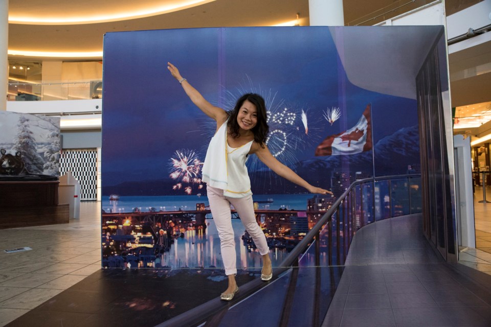 Aberdeen Centre's Joey Kwan tests out one of the new interactive visual exhibits