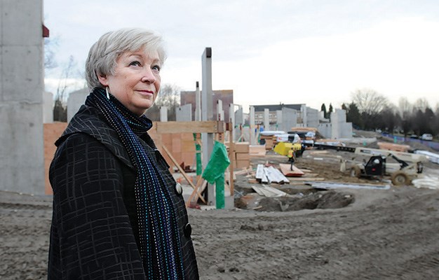 Sexsmith principal Jacquie Hall, near the new school construction on Ontario Street, notes the neighbourhood's changing demographics and dwindling student enrolment.