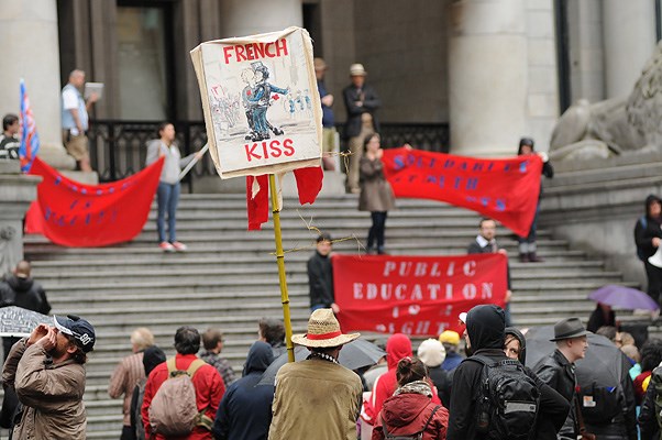 A crowd gathered at the Vancouver Art Gallery Tuesday to mark the 100th day of the Quebec protests.