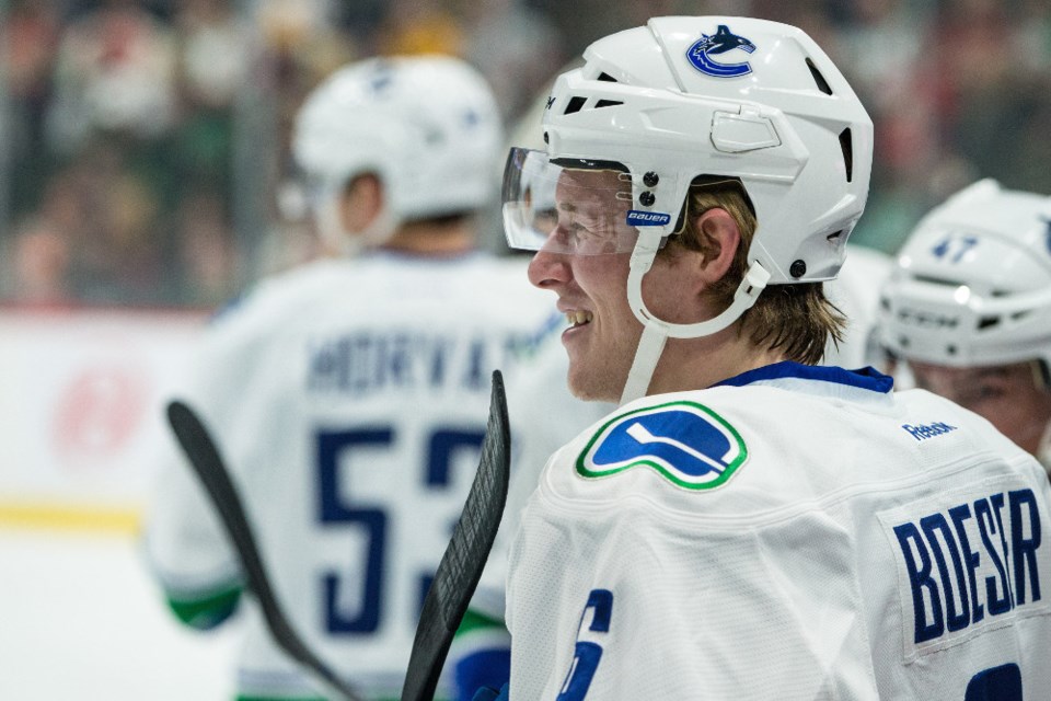 Brock Boeser smiles