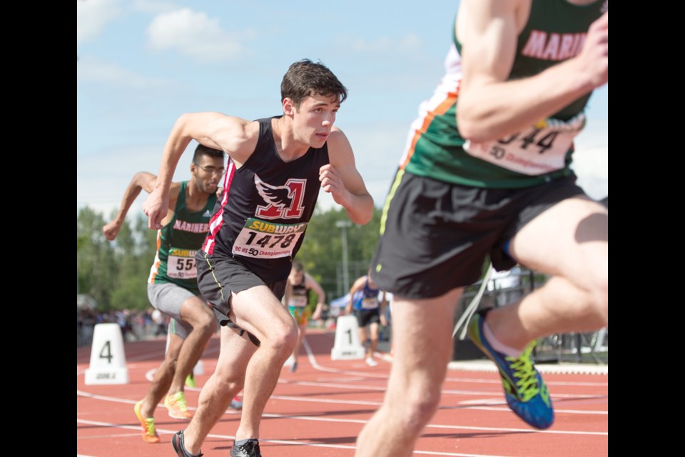 Luke Harris blasts out of the blocks during the 400-m final at the B.C. High School Track and Field Championships. Harris was recently chosen as one of 20 recipients across Canada of the prestigious Terry Fox Humanitarian Awards for his work promoting para-athletics. photo Mark Bates Photography