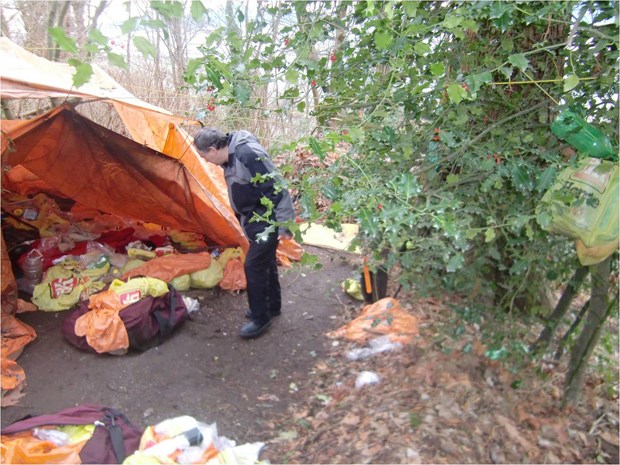 Bardolf Paul looks over his brother Greig's camp on the hill above Spanish Banks. Greig Paul died at the camp earlier this month.