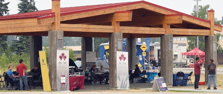 A half-dozen insurance companies have set up in the covered area at Prince George Senior Secondary to help clients forced to evacuate their homes due to the wildfires in the Cariboo.
