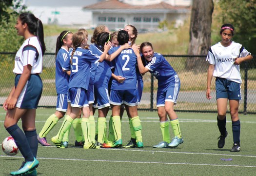 Members of the West Van SC U13 girls squad celebrate their win at the BC Soccer A Cup championships. photo supplied