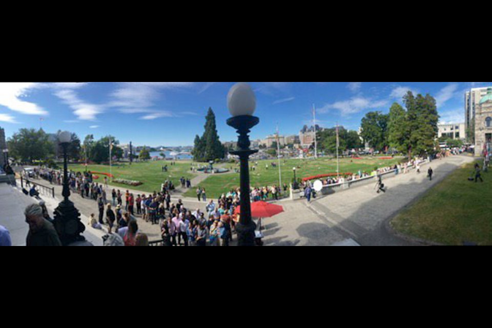 Lineup for the open house at the legislature on Tuesday, following the swearing in of the new NDP government. Tuesday, July 18, 2017