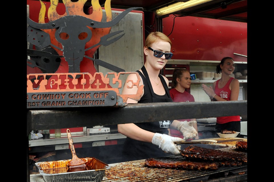 Prairie BBQ grills up the meat at Rocky Point Park in Port Moody this weekend.