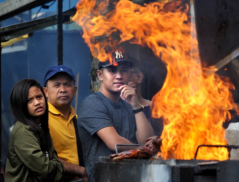 MARIO BARTEL/THE TRI-CITY NEWS
Flames flare up from one of the grills at the Port Moody RibFest.