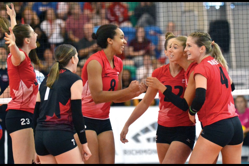 Canada celebrate a point during their Sunday match against the Czech Republic to close out the FIVB Grand Prix at the Richmond Olympic Oval.