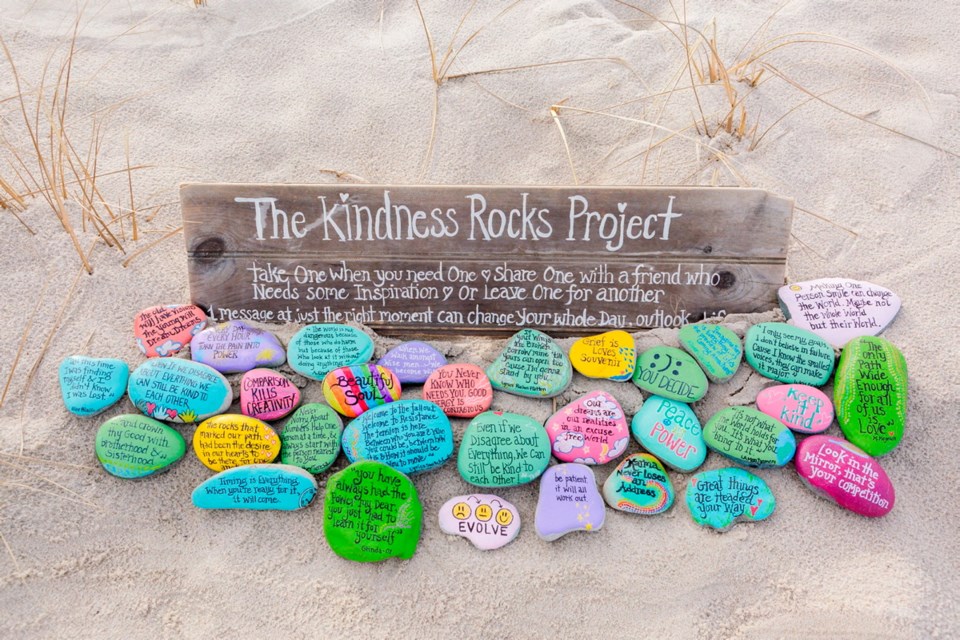 A garden of painted rocks at Sandy Neck Beach in Barnstable, Massachusetts, part of The Kindness Rocks Project.
