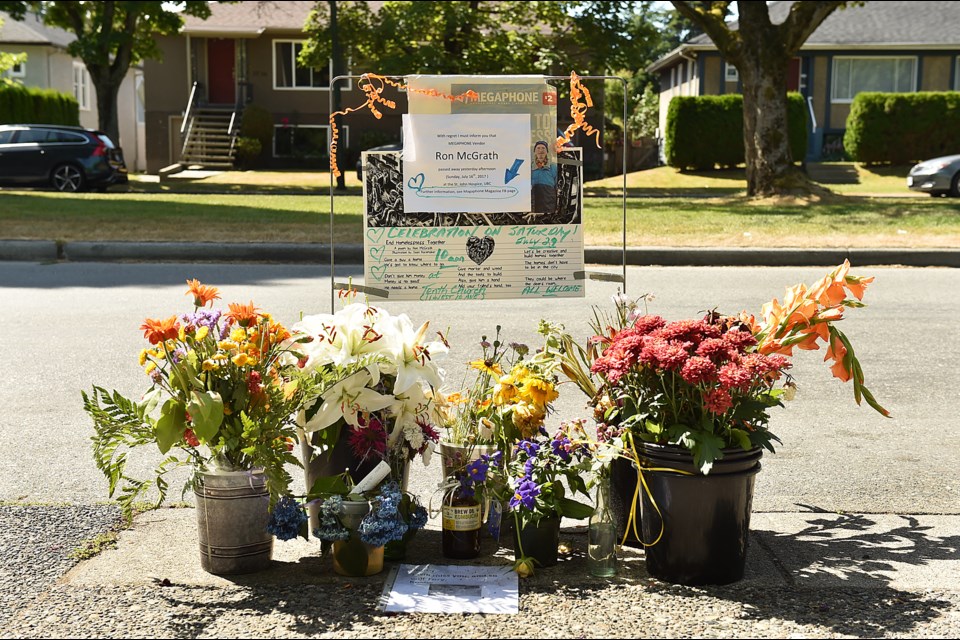 A makeshift memorial celebrating Ron McGrath’s life has been set up outside the Choices Market on 16th Avenue. Photo Dan Toulgoet