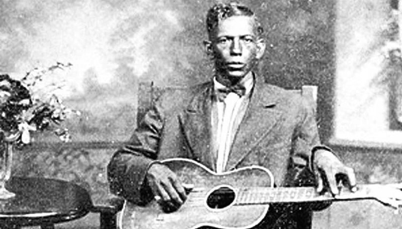 Delta bluesman Charley Patton sings about going to "The Nation" and the "territo" (Choctaw territory in Oklahoma) in "Down the Dirt Road Blues," a song recorded in 1929 for Paramount Records. He is one of the musicians with Indigenous heritage featured in Rumble: The Indians Who Rocked the World.