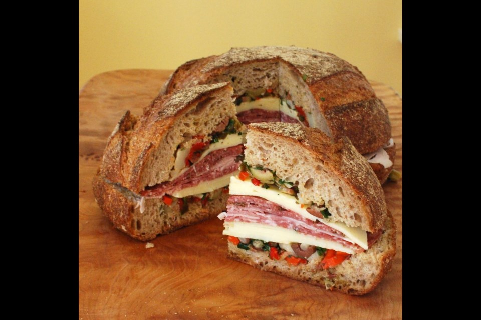 Muffuletta was created by early Sicilian immigrants to New Orleans and is perfect for a picnic. Take the whole-loaf sandwich with you and cut it into wedges at the picnic site.