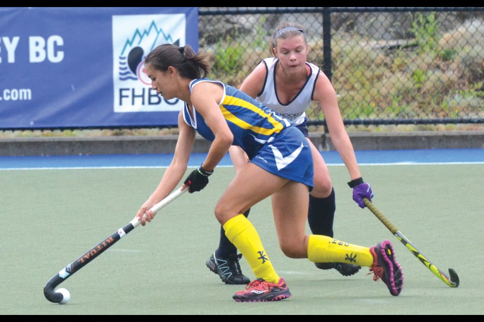 Richmond Field Hockey Club's Dakota Chan takes the ball up field during action against Alberta. She was named to the Tournament 11 Team in helping the B.C. Rams finish second in the U18 Division at the National Championships in Surrey.