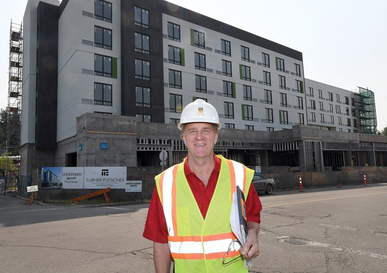 Developer Rod McLeod outside the new Courtyard by Marriott Hotel being built in downtown Prince George.