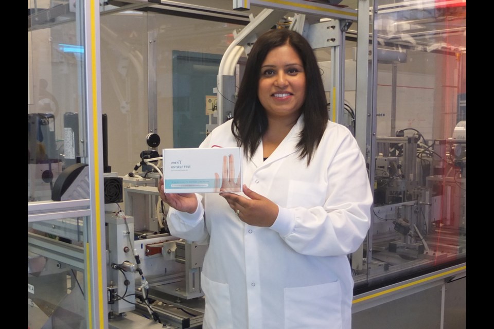 Livleen Veslemes, of Biolytical Laboratories, shows off the company’s new HIV self-testing kit, which was recently launched in the Netherlands where it can be sold off the shelf in pharmacies. Photo by Daisy Xiong/Richmond News