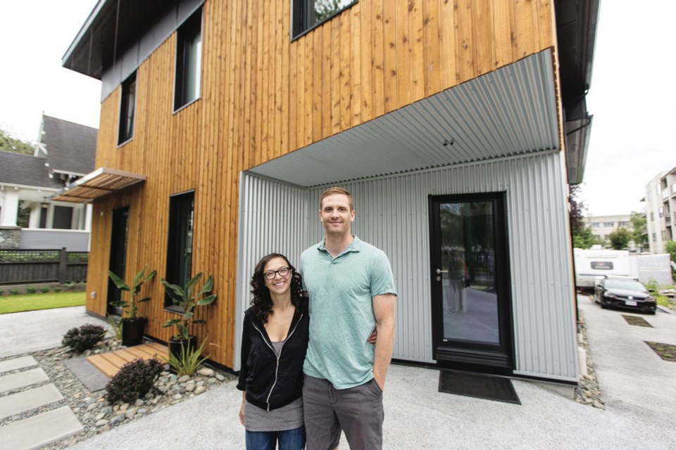 Homeowners Aneesa Blake and Reed Cassidy fell in love with the look of the cedar siding on their Passive House. The original plan was to paint it grey, but the couple like its contrast with the corrugated steel.