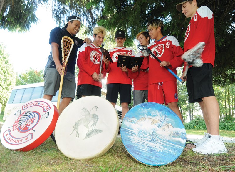 Head coach James Manalo reunites with North Shore Indians Intermediate B lacrosse players Sean George, Brodie Jacobs, Nick Baker, Andrew Joseph and Justin Wheatley following a season that started in tragedy and ended with surprising success. photo Mike Wakefield, North Shore News