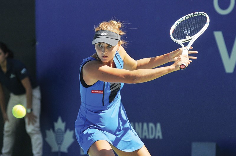 Maryna Zanevska fires a backhand on her way to a win over Danka Kovinic in the Odlum Brown VanOpen women’s final played Sunday at West Vancouver’s Hollyburn Country Club. Germany’s Cedrik-Marcel Stebe won the men’s title 6-0, 6-1 over Australia’s Jordan Thompson as the VanOpen came back in full force following a one-year hiatus. photo Kevin Hill, North Shore News