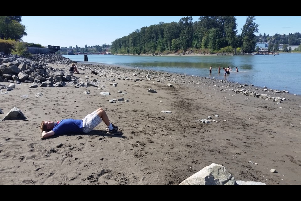 Mayor Jonathan Cote took a break from his tour of New Westminster’s 44 parks at the beach in Queensborough on Sunday afternoon.