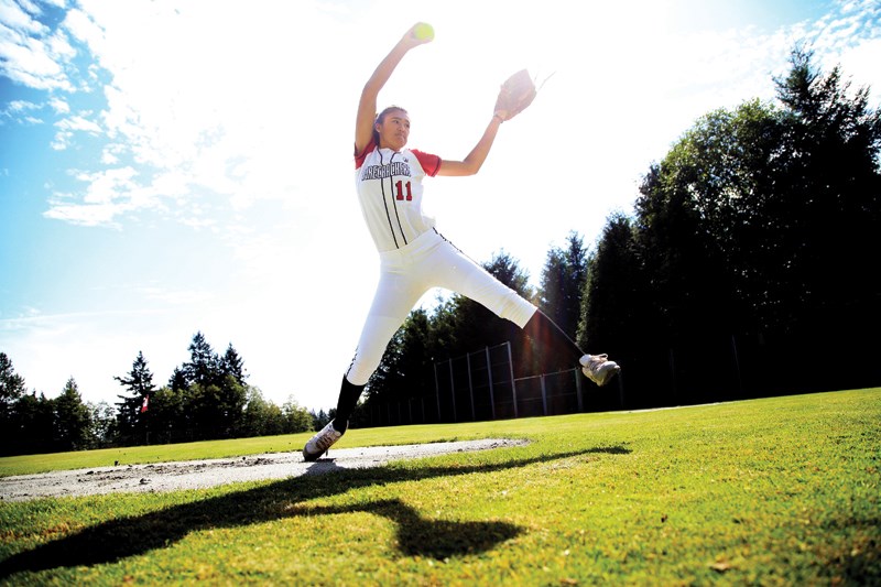 North Vancouver’s Izzy Dino fires a practice pitch. The six-foot-two 17-year-old recently returned from Lloydminster where her dominant pitching helped her club team, the Richmond Islanders, win the consolation final. Dino put up a 5-1 record in the tournament with a 0.84 record pitching against the top players from across Canada. photo Lisa King, North Shore News
