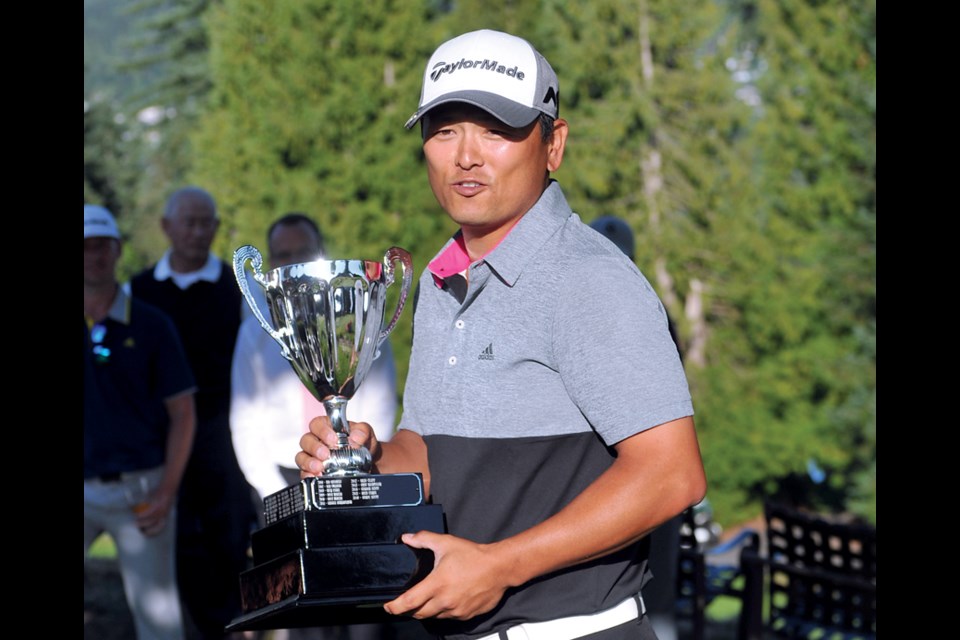 John Shin holds the William Thompson Trophy following his win on the second sudden-death playoff hole at the PGA of BC Championship Friday at West Vancouver's Capilano Golf and Country Club. photo Paul McGrath, North Shore News