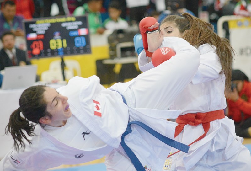 West Vancouver’s Parvin Mayan scores a high-risk kick during the gold medal match at the Panamerican Karate Federation Junior Championships Saturday in Buenos Aires, Argentina. Mayan lost the match 4-3 but earned a podium spot as well as a ticket to the junior world championships scheduled for Oct. 25-29 in Tenerife, Spain. photo supplied