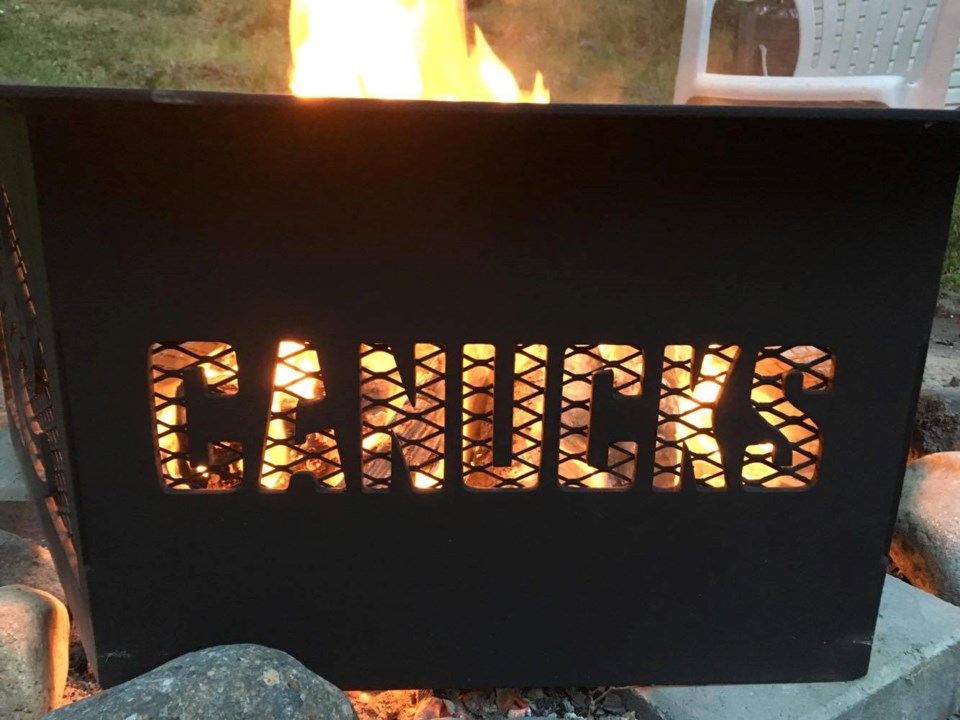 Canucks fire pit - Canucks wordmark