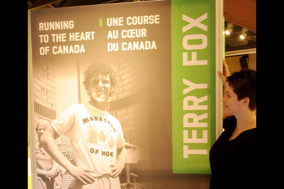 Kelly Brown of PoCo Heritage Museum and Archives gave a tour to The Tri-City News last Saturday of the national touring exhibit Terry Fox: Running to the Heart of Canada, which opens today in The Outlet (behind PoCo city hall). The display is free to the public and includes an activity corner were attendees can write on a postcard to describe the legacy of the hometown hero.