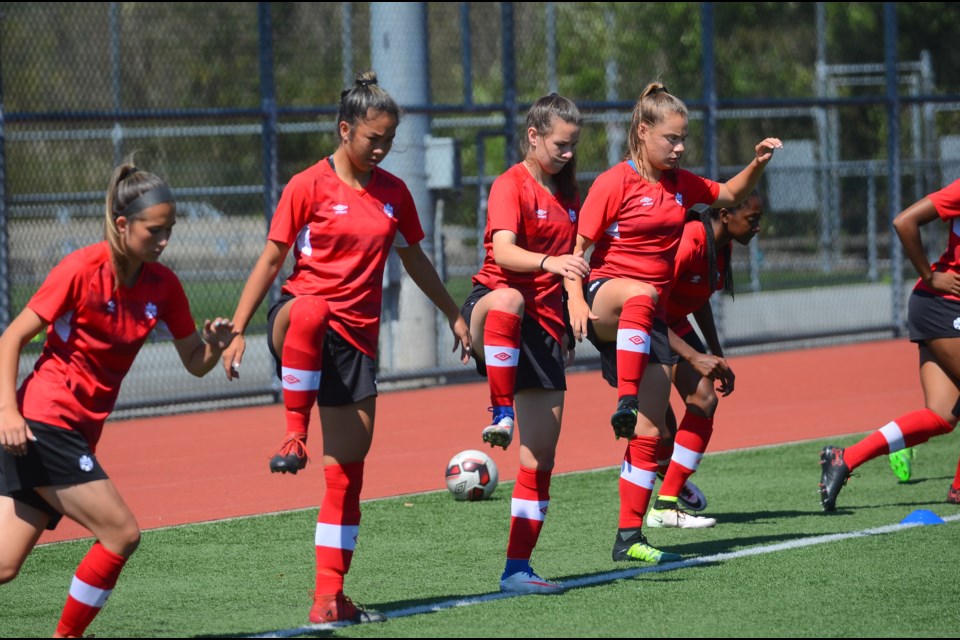 Burnaby’s Kaela Hansen and Emma Regan were among the soccer players invited last month to the Canadian women under-20 summer camp at the Fortius Centre. The two, shown above with their teammates, received instruction from national women's head coach John Herdman and the u20 women's coaching staff.