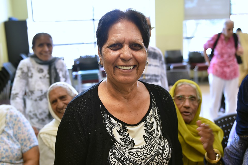 Ramesh Kalia helps run the South Asian Women's Wellness program at South Vancouver Neighbourhood House with Mohinder Sidhu. Photo Dan Toulgoet