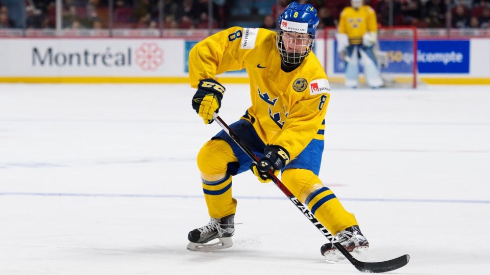 Rasmus Dahlin playing for Team Sweden