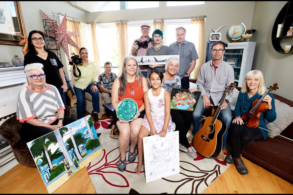 Artists gather in preparation for the Living Room Art in the Heights event, returning for its fourth year on Sept. 30.