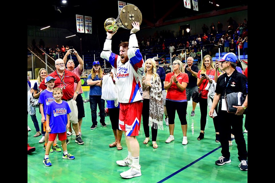 JENNIFER GAUTHIER/NEW WEST RECORD
Port Coquitlam's Curtis Dickson (#71) of the Peterborough Lakers celebrates his family's second Mann Cup senior lacrosse national championship in New Westminster's Queen's Park Arena. The Lakers won the best-of-seven series four games to two and Curis was the second Dickson in his family to hoist the Mann Cup after his father won it for the Salmonbellies 26 years ago.