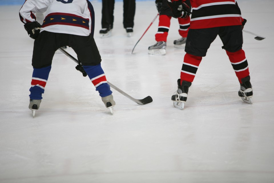 Teaching kids life lessons along with hockey skills