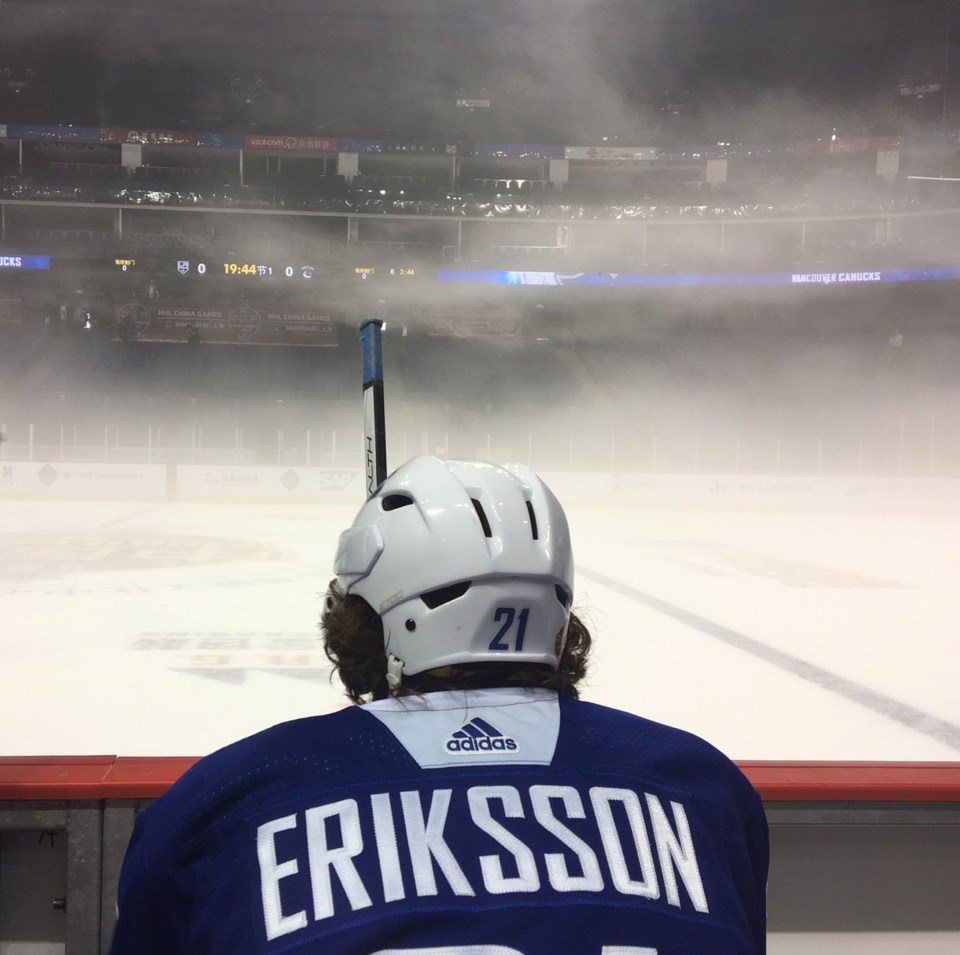 Loui Eriksson looks out at the fog at Canucks practice in Shanghai, China.