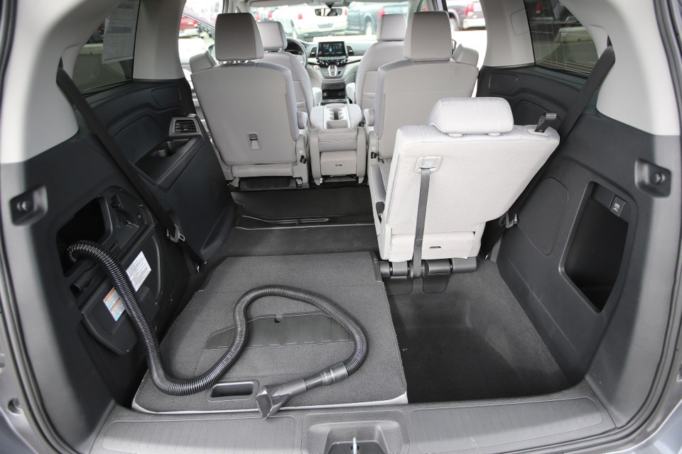The redesigned 2018 Honda Odyssey features a built-in vacuum cleaner in the cargo bay for those inevitable spills of chips, popcorn or sand.