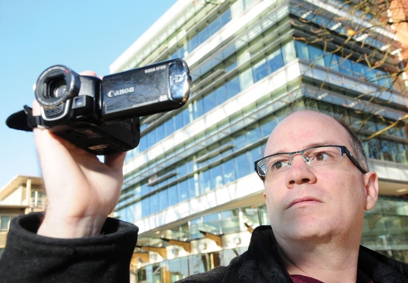 Shane Nelson w video camera