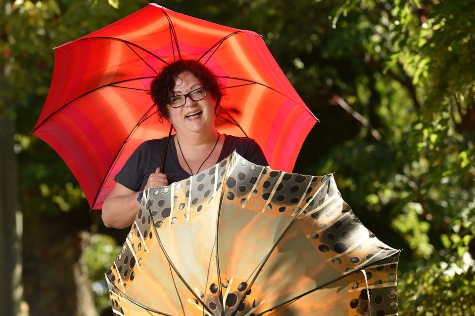 Corry Flader, president of the Umbrella Shop and a third-generation umbrella maker, is shutting her beloved business, which her grandfather started more than 80 years ago. Photo Dan Toulgoet