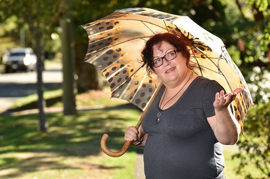 Umbrella Shop president and third-generation umbrella maker Corry Flader is preparing to shut down the company’s two stores. Photo Dan Toulgoet