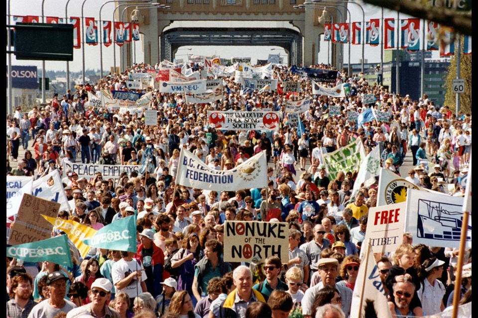 Peace marchers on the Burrard Bridge demonstrate for an end to the Gulf War, 1991. Bill Keay/Vancouver Sun photo