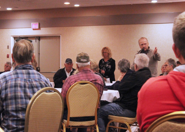 CPA John Kurjata talks tax sense at a recent MP Zimmer open house.