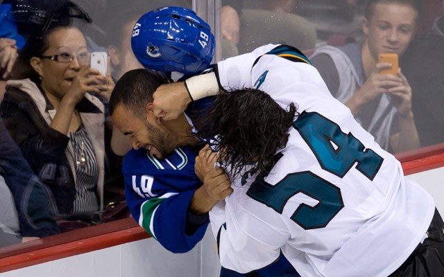 Darren Archibald gets punched in the head, Canucks