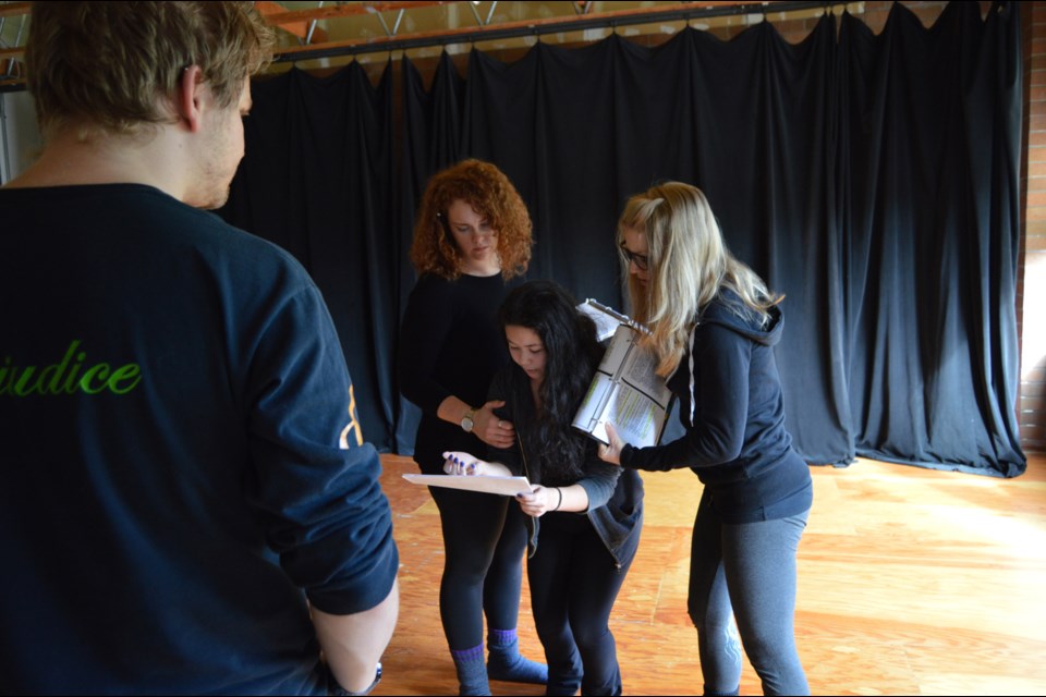 Director Julian Legere, in foreground, and Michelle Cyr, at left of three actors, are the founders of the new theatre company Bread is Not Enough.