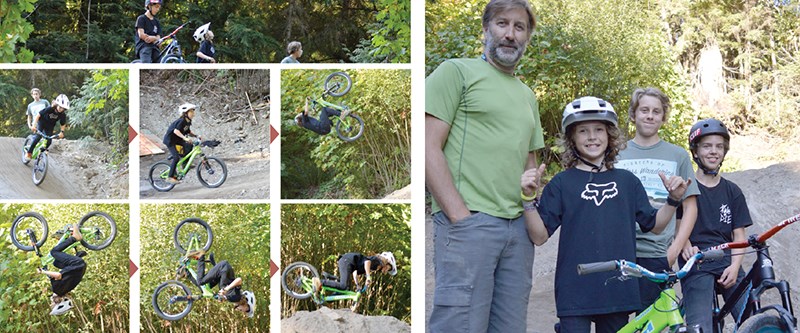 Above, Jackson Goldstone pulls off a backflip at one of the newly-completed jumps in the bike park. In the right picture, some of the volunteers who’ve pitched in to create the course. Ron Goldstone is at the far left with his son Jackson beside him riding a neon green bike. Ben Thompson is to the far right.