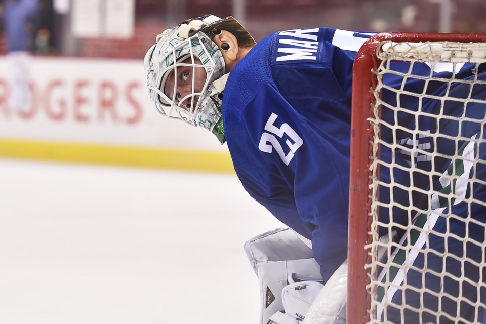 Jacob Markstrom looks back from in the Canucks net