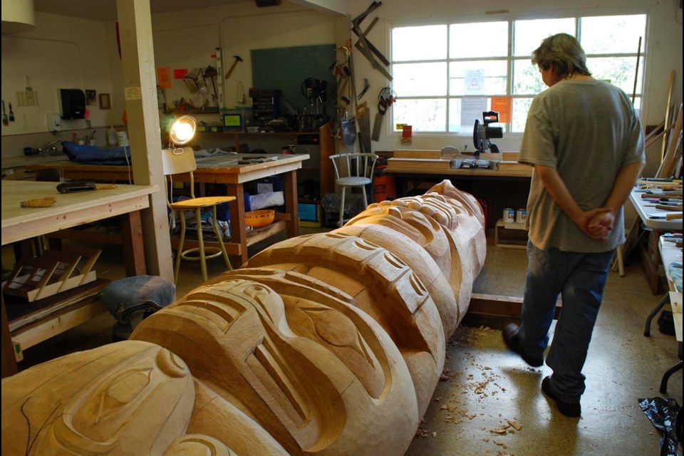Tony Hunt Jr. works on a totem pole, using his inimitable style to uphold the tradition of the Kwakwaka'wakw people.