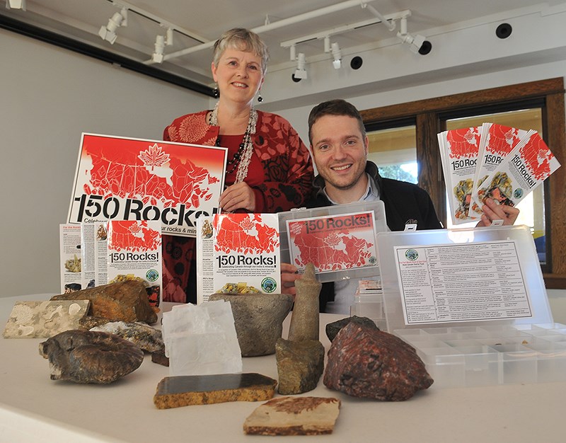 Rose Kapp and Andrew Danneffel of the Port Moody Rock and Gem Club — which this year marks its 50th anniversary — with some of the minerals, gems and artifacts that will be on display this weekend at the Kyle Centre. The group show celebrates Canada 150 with specimens from each of the country's provinces and territories.