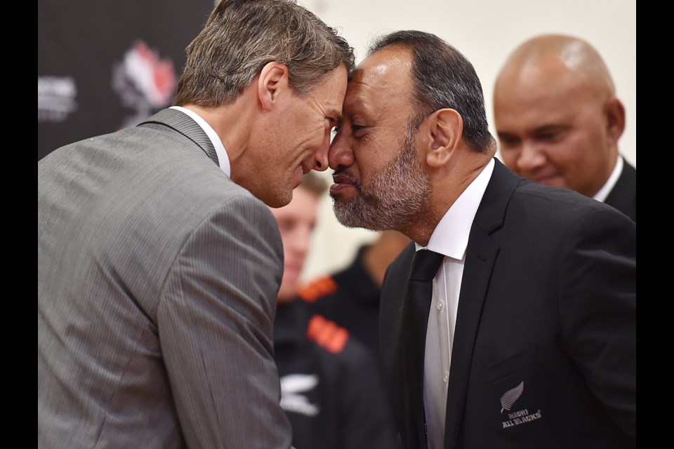 Mayor Gregor Robertson participates in ceremonial welcome greeting with Maori All Blacks board member Bernard Te Paa at Britannia secondary school. Photo Dan Toulgoet